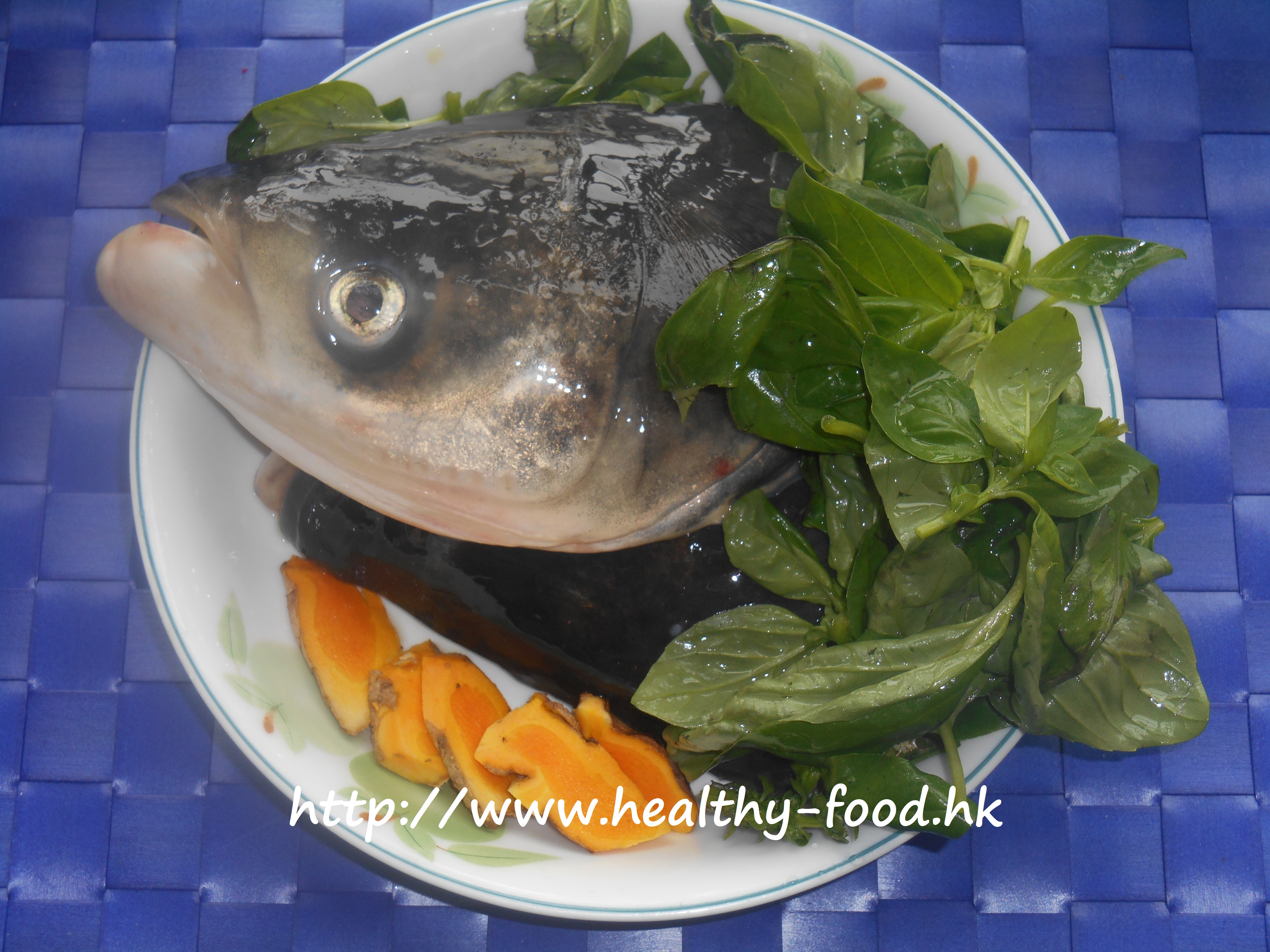 Basil Leaf, Fresh Turmeric and Fish Head Soup